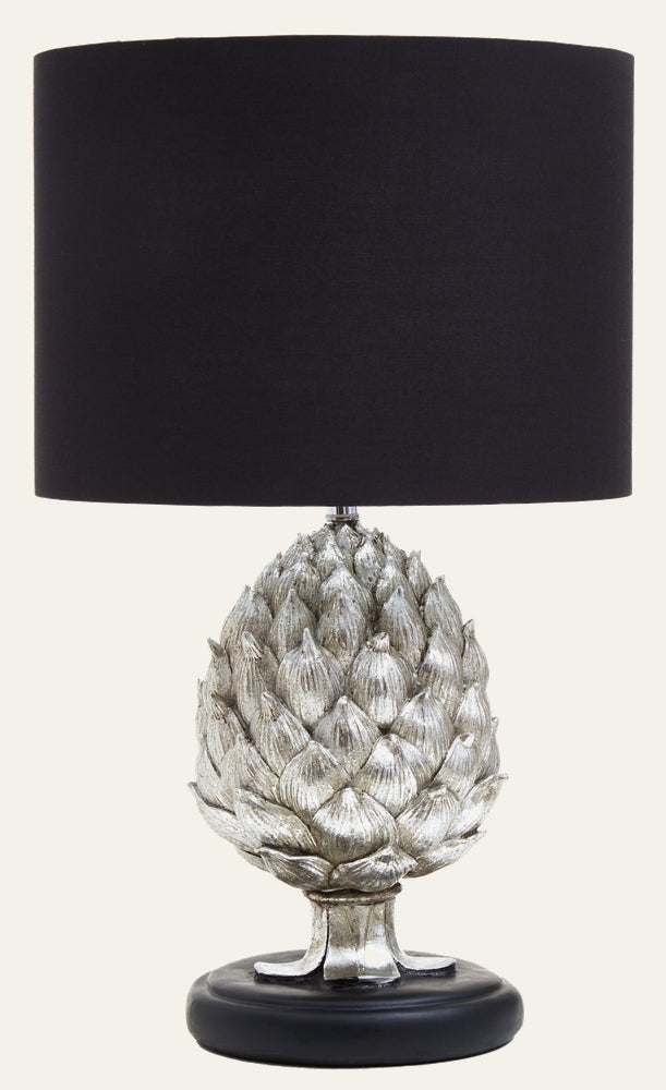 Orelia Artichoke Table Lamp with sculpted artichoke-shaped base in antiqued silver finish, round black pedestal base and black fabric drum shade