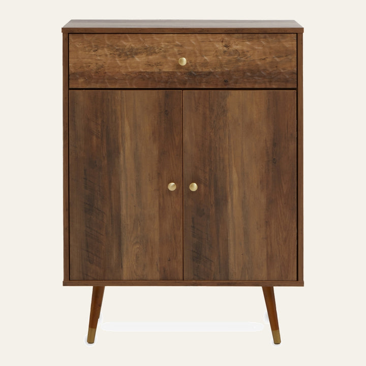Orena Door Drawer Cabinet in warm walnut-tone wood finish, single top drawer and double doors with round brass knobs, tapered mid-century legs with brass-capped feet