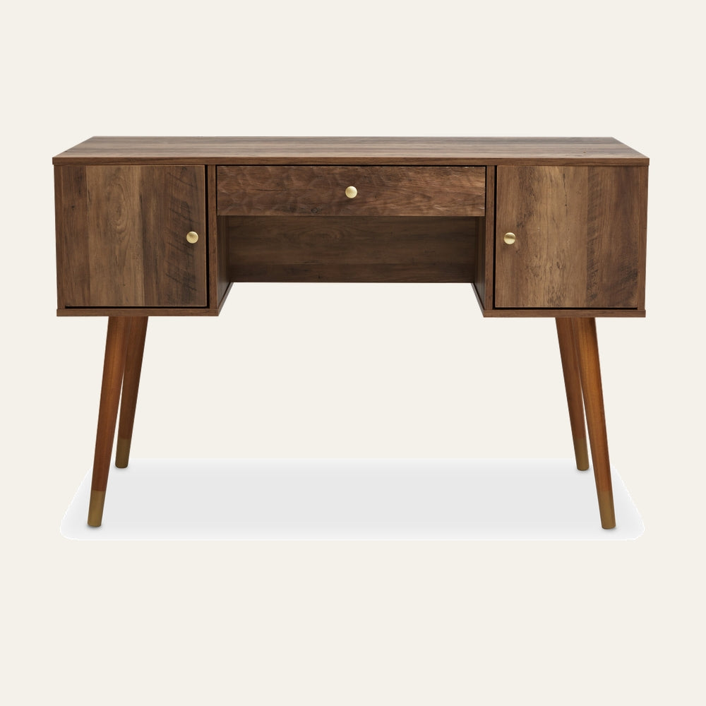 Orena Wood Storage Desk — midcentury-style wood desk with warm walnut grain, two side cabinets and center drawer, tapered legs with brass-capped feet and round brass knobs