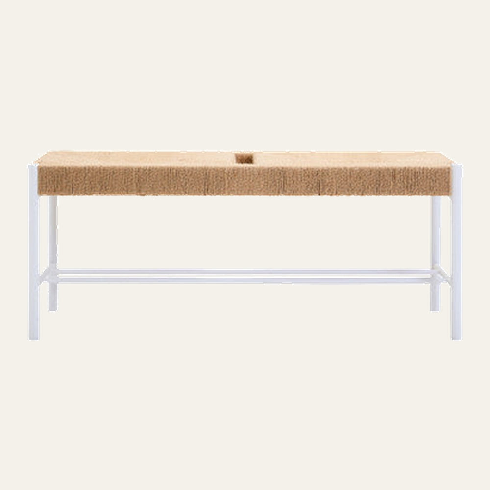 Quildor Open Frame Bench with rectangular tan woven seat featuring a small center groove atop a white open metal frame