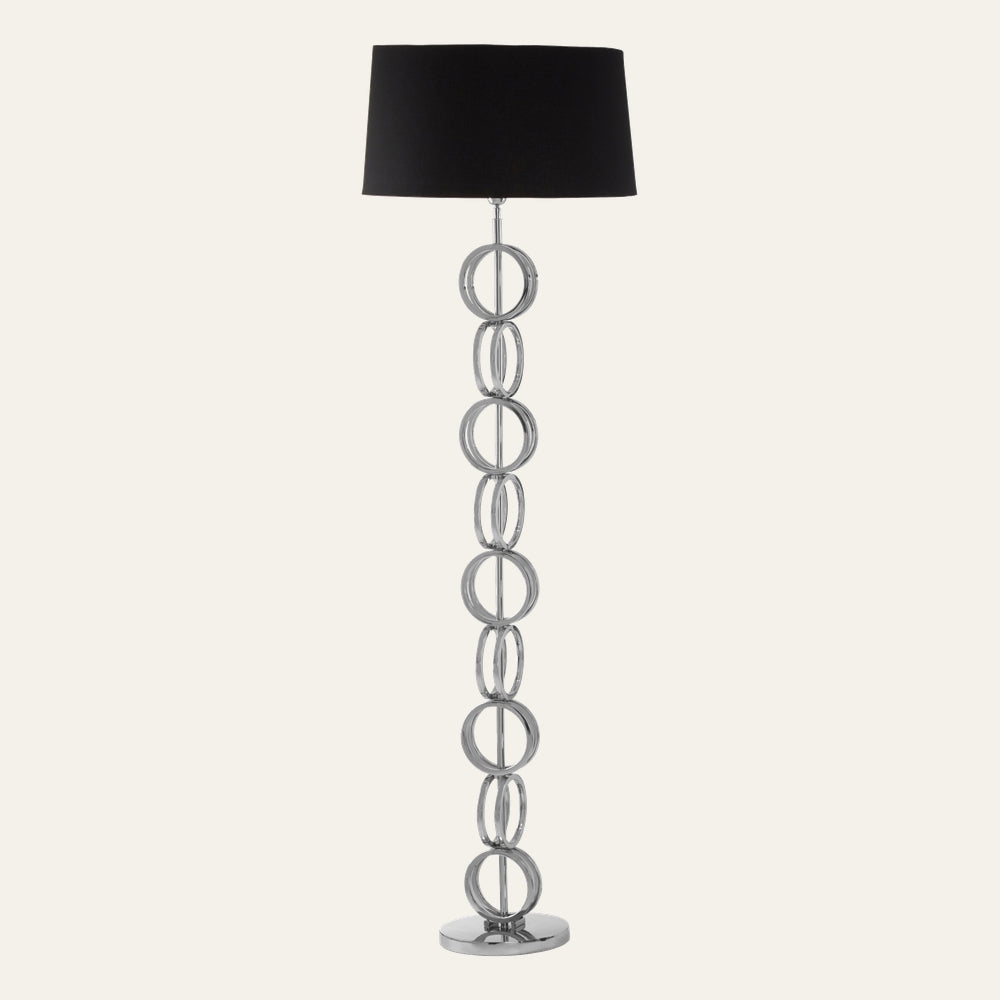 Selva Multi Ring Floor Lamp with stacked polished chrome rings column, black fabric drum shade and round chrome base