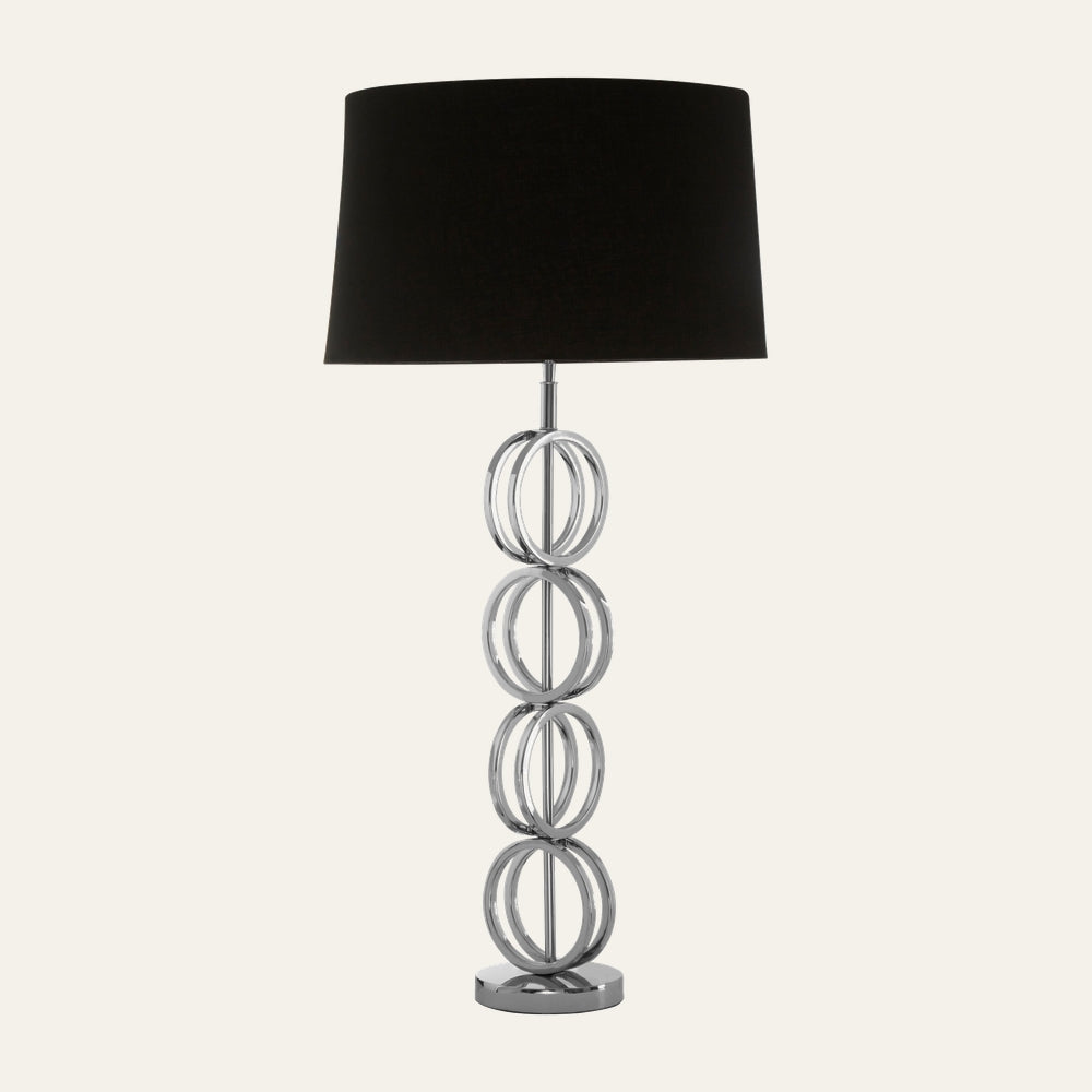 Selva Multi Ring Table Lamp with stacked polished chrome ring base and black fabric drum shade