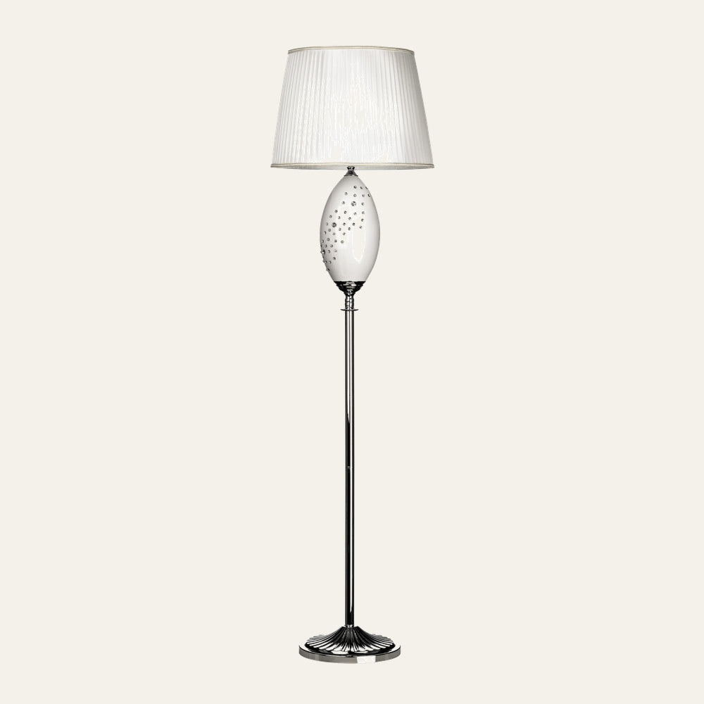 Serelle Floor Lamp with white pleated fabric shade, oval dotted glass accent, polished chrome stem and fluted round base