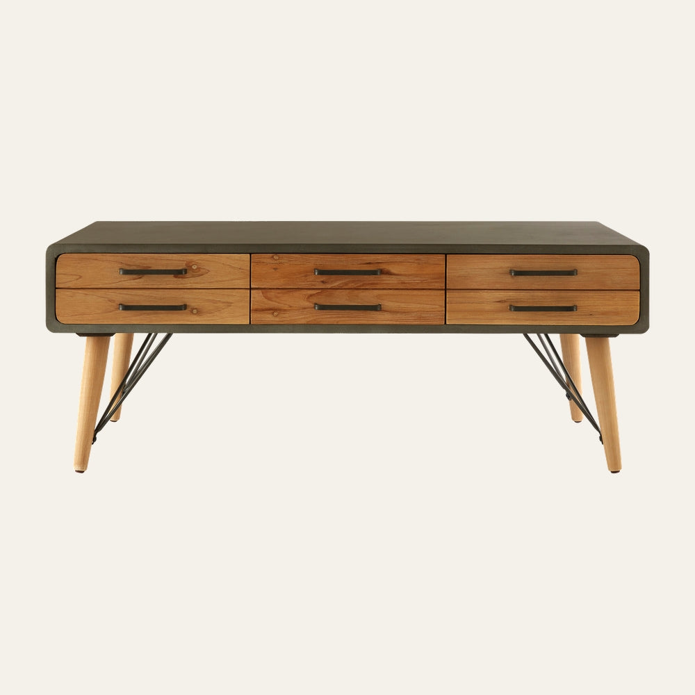 Velin Six Drawer Coffee Table with dark matte rounded-edge frame, six natural wood drawer fronts with black metal handles, tapered light wood legs and black metal cross-bracing