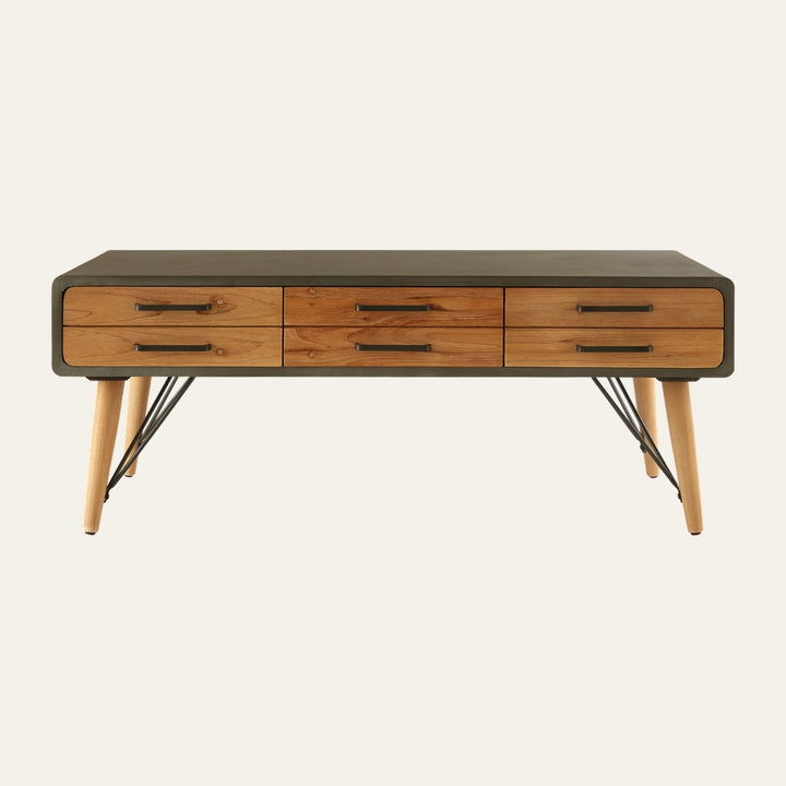 Velin Six Drawer Coffee Table with dark matte rounded-edge frame, six natural wood drawer fronts with black metal handles, tapered light wood legs and black metal cross-bracing